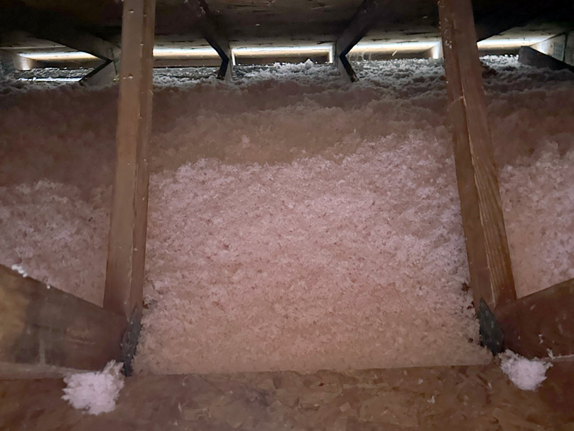 Blown-in insulation in attic