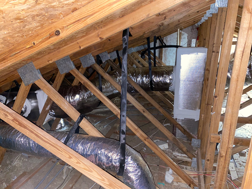 Ductwork repair in home attic