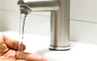 Water pressure from bathroom tap Photo by Cosmin Ursea on Unsplash
